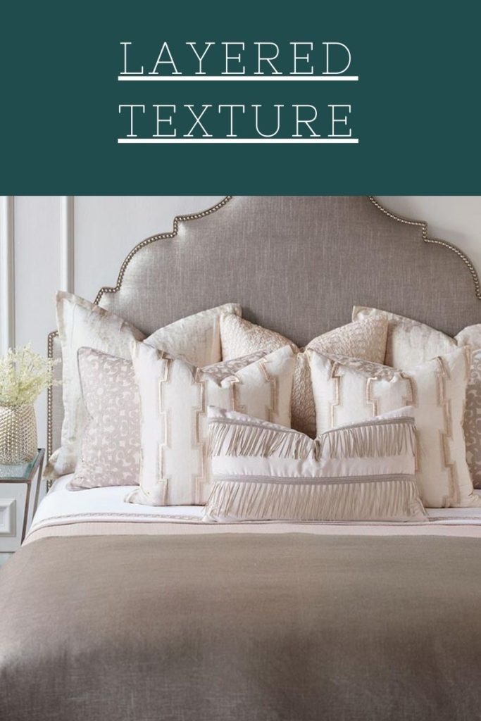 Layered textures as seen on this Eastern Accents bed, give your Chattanooga bedroom furniture a designer look.