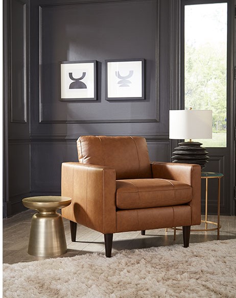 This camel colored leather chair by Best Home Furnishings will help add depth to your Chattanooga living room furniture.