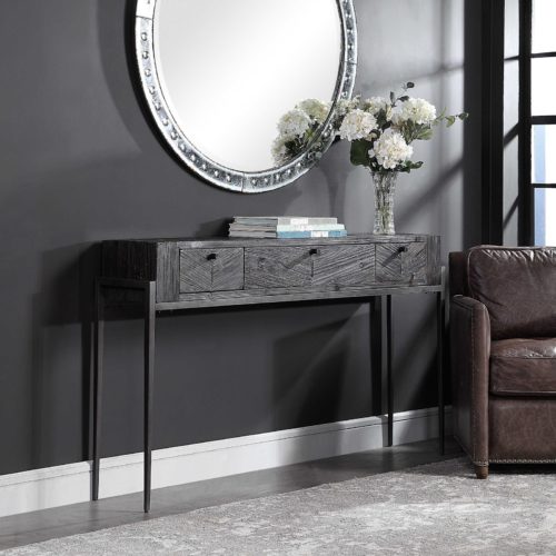 Dark grey console table by Uttermost adds the perfect touch for a moody home design.