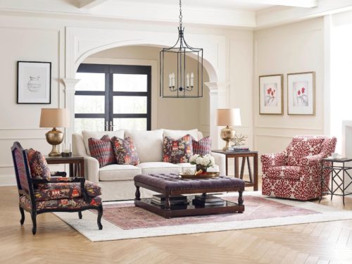 living room sofa with floral accent chairs
