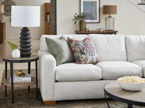 furniture patterns featuring grey sofa and patterned throw pillows.